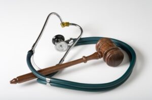 Gavel and Stethoscope on white background - Chicago SSD Attorney